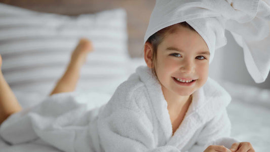 Essential hotel amenities for children featuring a children's bathrobe