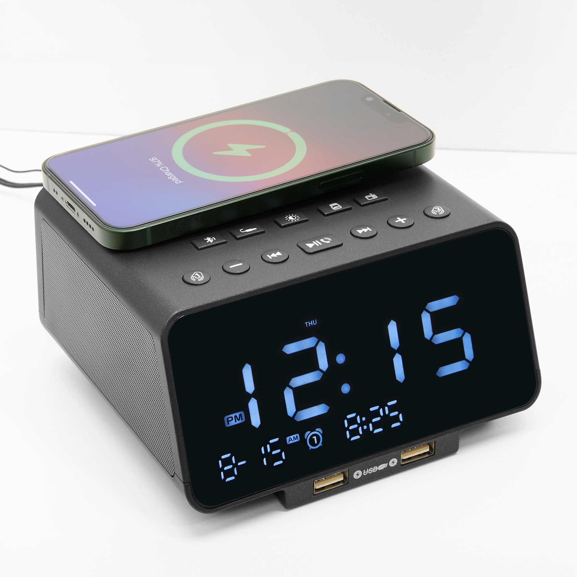 Phone charging wirelessly on Regent digital alarm clock