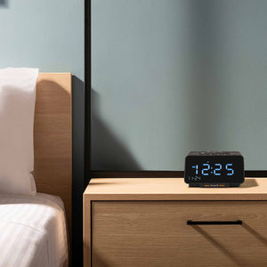 Corby Regent alarm clock on hotel bedside table